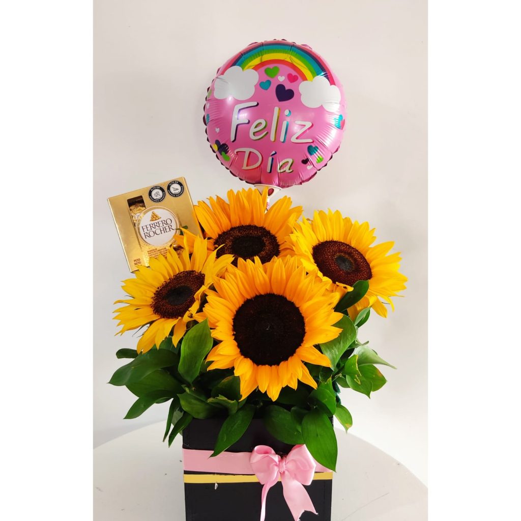 Arreglo de giorasoles, chocholates- floristeria cali