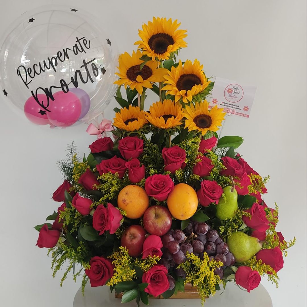 Arreglo con frutas en rosas rojas y girasoles, floristeria cali