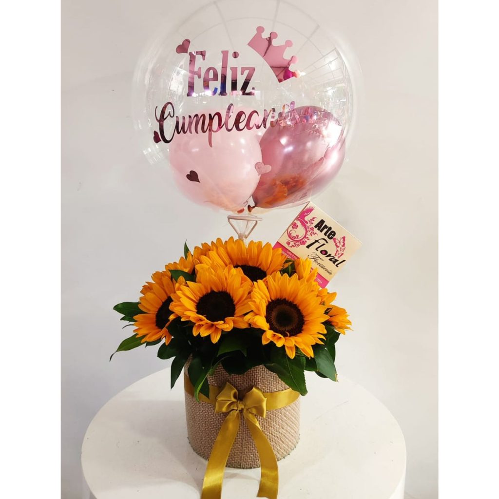 Cilindro de girasoles, y ferreros- floristeria cali