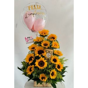 Ramo floral en girasoles, chocolates ferreros floristeria cali
